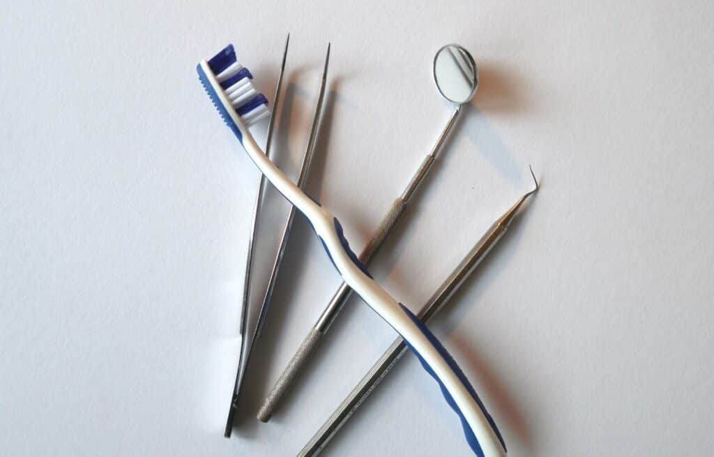Dentist tools and toothbrush