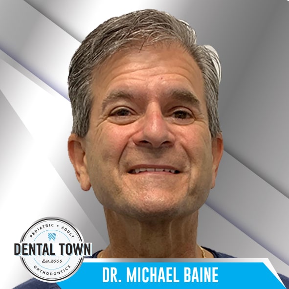 Dr. Michael Baine gray hair smile